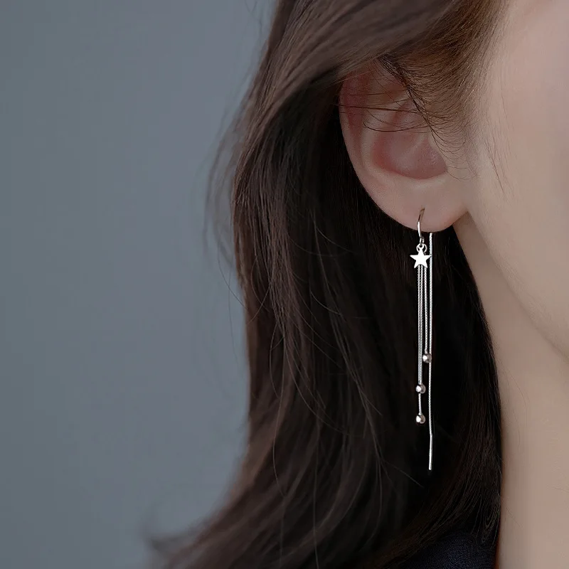 Boucles d’oreilles étoile à pampilles argentées – 8 cm